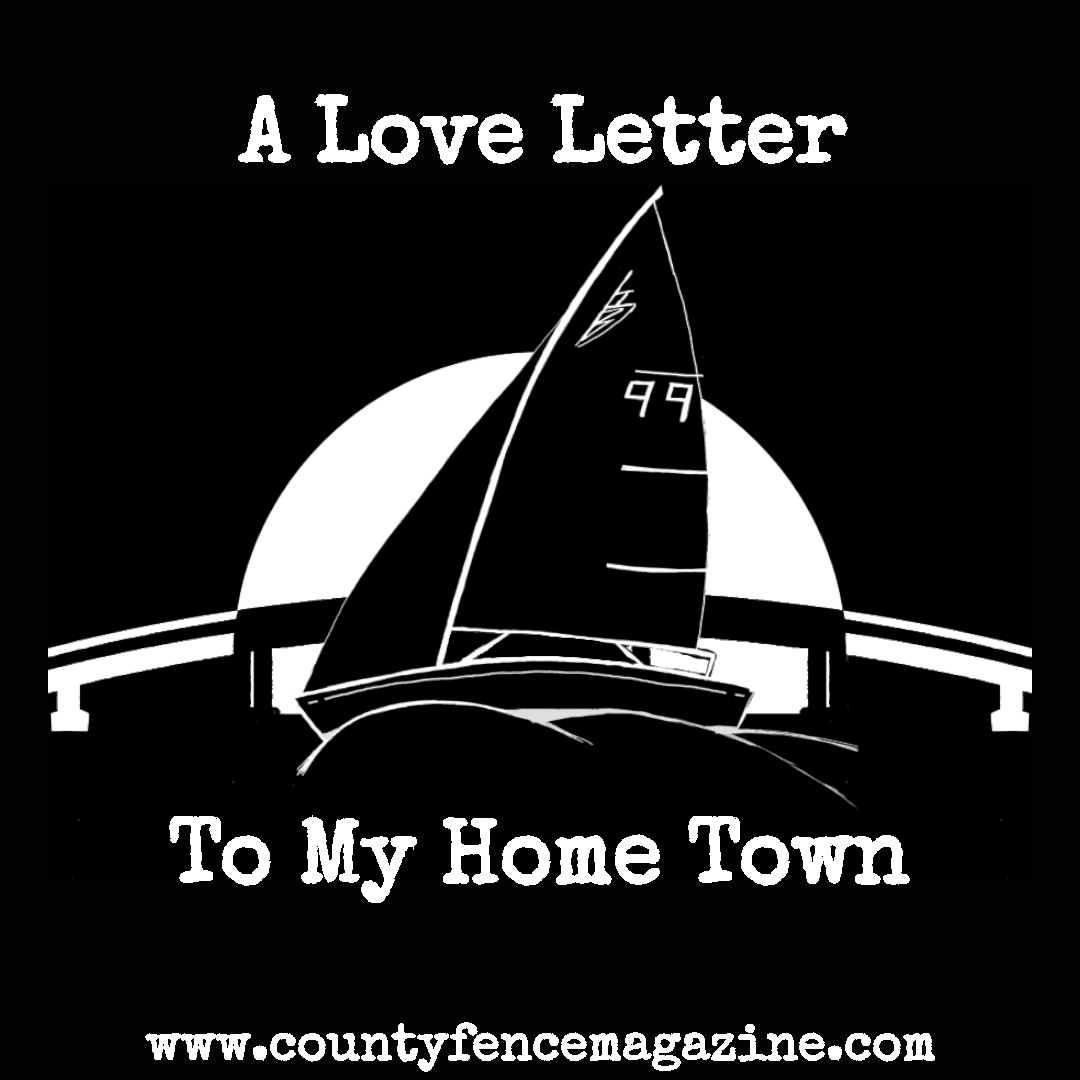 Title card for article: A Love Letter to my Home Town. Features a sailboat sailing past a bridge and the setting sun.
